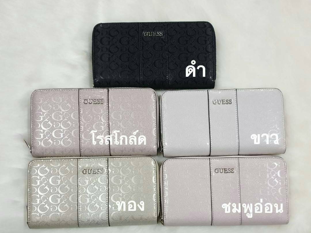 GUESS FACTORY WOMEN'S ZIP AROUND LONG WALLET กระเป๋าสตางค์หนังทรงซิปรอบลาย G ด้านหน้าติดโลโก้แบรนด์ด้วยโลหะสวยหรู ภายในมีช่องใส่ธนบัตร ช่องใส่บัตรหลายช่อง มีช่องซิปใส่เหรียญ สามารถใส่ไอโฟนพลัสได้ มีให้เลือกถึง 5 สี สวยคุ้ม น่าใช้มากๆค่า
