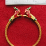 กำไลพญานาค2เศียรเนื้อทองเหลืองชุบทองไมครอนลงยาพร้อมใบคาถาค่ะ