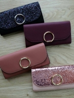 Charles & Keith Circular Detail Wallet กระเป๋าสตางค์ใบยาว ด้านหน้าตกแต่งด้วยโลหะกลม เปิด - ปิดกระเป๋าด้วยกระดุมแม่เหล็ก ด้านในมีช่องใส่บัตรหลายช่อง มีช่องใส่ธนบัตร และช่องซิปใส่เหรียญค่ะ ด้านหลังมีช่องอีก 1 ช่อง
