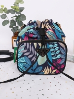 Prada bucket bag Premium gift New in! กระเป๋าถือหรือสามารถสะพายข้าง ทรงขนมจีบ สุดน่ารักดีไซน์ใหม่ super cute! วัสดุ nylon เนื้อหนา อะไหล่ทองด้านหน้ามีโลโก้แบรนด์ พร้อมช่องซิป กระเป๋า เปิดปิดแบบ drawstring ภายในกระเป๋าโล่ง ใส่ของได้จุ พร้อมสายยาวลาย saffia