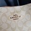 COACH 2312 SMALL TOWN BUCKET BAG IN SIGNATURE CANVAS รุ่นยอดนิยมใบเล็กมาครบสีแล้วจ้า กระเป๋าทรงบัคเก็ต สีผู้ดี๊ผู้ดี ตัวกระเป๋าดีไซน์คลาสสิคลายซี ดูโดดเด่น วัสดุหนังแคนวาสเคลือบลาย สวยคมทุกมุมจริงๆ!! เปิด-ปิดด้วยกระดุมแม่เหล็กทั้ง 2 ฝั่ง ภายในเป็นช่องโล่ง