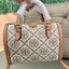 mini TORY BURCH FACTORY MONOGRAM JACQUARD BOSTON BAG กระเป๋าทรงหมอนรุ่นใหม่ล่าสุดจาก TORY BURCH FACTORY วัสดุ Woven Jacquard & Leather ในลาย Jacquard จะถือหรือสะพายก็สวยหรู ทรง Boston อะไหล่ทอง