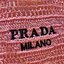 PRADA RAFFIA TOTE BAG สวยไม่ซ้ำใคร สไตล์บีช เหมาะมากกับการสะพายไปเที่ยวทะเล หรือจะใช้ในวันสบายๆก็ตอบโจทย์ กับกระเป๋าสะพายสานใบใหญ่ ตัวกระเป๋าเป็นวัสดุสังเคราห์จากธรรมชาติ