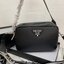 PRADA CAMERA LEATHER BAG with shoulder strap / PRADA MESSENGER BAG BLACK กระเป๋าสะพายหนัง รุ่น Unisex ใช้ได้ทั้งชายหญิง ขนาดกำลังดี ดีไซน์เรียบ แต่หรูหรา พร้อมสายสะพาย 2 เส้น ปรับระดับได้ สามารถสะพายไหล่ และครอสบอดี้
