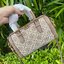 small: Tory burch T Monograme Jacquaed Mini Duffle Bag เป็นทรงกระเป๋าที่มีความฮอตฮิตตลอดกาล ด้วยรูปทรงคลาสสิคและเหมาะใช้งานเข้ากับทุกสถานการณ์ ไม่ว่าจะเป็นกระเป๋าสะพายไหล่ เพิ่มความคล่องตัวและเข้าได้กับทุกลุค ไม่ว่าจะเป็นวันสบายๆ หรือวันที่ต้องออกไปทำกิจก
