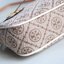 Tory Burch T Monogram Braided Floral Studio Shoulder Bag กระเป๋าถือหรือสะพายไหล่ลาย Monogramวัสดุผ้าJacquard+หนังแท้ ตัดเย็บอย่างปราณีต ผสานงานแกะสลักหนังสุดวิจิตร ประดับตกแต่งด้วยดอกไม้เพิ่มความหรู เป็นกระเป๋าดอกไม้ของฤดูกาลนี้ที่เพิ่มความซับซ้อนและแสนหว