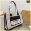 Burberry Freya Canvas Tote Bag Large กระเป๋าสะพายทรงโท้ทใบใหญ่จุใจ ดีไซน์ทรงเหลี่ยมสวยอยู่ทรง ด้านหน้ามีช่องใส่ของ ภายในโล่งกว้างจุของใช้ได้เยอะ