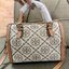 mini TORY BURCH FACTORY MONOGRAM JACQUARD BOSTON BAG กระเป๋าทรงหมอนรุ่นใหม่ล่าสุดจาก TORY BURCH FACTORY วัสดุ Woven Jacquard & Leather ในลาย Jacquard จะถือหรือสะพายก็สวยหรู ทรง Boston อะไหล่ทอง