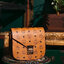 M.C.M PATRICIA SHOULDER BAG IN VISETOS กระเป๋าสะพายไหล่/ข้าง ดีไซน์ได้อย่างมีสไตล์ ดูมีสเน่ห์ด้วยทรงกระเป๋าที่โค้งบริเวณฐาน ให้ความรู้สึกนุ่มนวลมากขึ้น ใบนี้แมทช์ได้กับทุกลุค เท่ๆ casual หรูหรา หวานๆ ก็ทำให้โดดเด่นได้ด้วยไอเท็มนี้ วัสดุหนังแคนวาสคุณภาพดี 