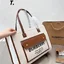 BURBERRY Leather-trimmed embroidered canvas tote / BURBERRY FRAGRANCES LARGE TOTE BAG / BURBERRY Freya Tote Bag วัสดุ Canvas & Leather ดีไซน์สวยอยู่ทรงสไตล์ Casual ด้านหน้ามีช่องใส่ของ ภายในโล่งกว้างและจุสุดๆสามารถใส่เอกสารA4 หนังสือ ของใช้ได้เยอะ หูหิ้วห