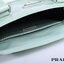 PRADA Small brushed leather tote กระเป๋าTote ขนาดเล็กที่มีดีไซน์ทรงเหลี่ยมโฉบเฉี่ยว วัสดุจากหนังเงาซึ่งเป็นวัสดุที่โดดเด่นของแบรนด์มาตั้งแต่ยุค 90'