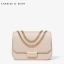 CHARLES & KEITH PUSH-LOCK CHAIN SLING BAG Best seller กระเป๋าอยู่ทรงสวย วัสดุลายคาร์เวียร์หนังสวยใช้ เปิดปิดด้วยตัวล็อค ด้านในมีช่องซิป 1 ช่อง จะสะพาย แบบสายโซ่คู่/เดี่ยวก็สวยน่ารักค่ะ