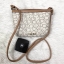 CALVIN KIEIN MINI CROSSBODY BAG กระเป๋าสะพาย size mini น่ารัก วัสดุหนังลายแบรนด์รอบใบ ด้านหน้าประกับ l0go brand อะไหล่ทอง เปิดปิดกระเป๋าแบบซิป ภายในโล่ง ใส่ธนบัตร, bookbank, มือถือได้ทุกรุ่น สายสะพาย เป็นหนังนิ่มสะพายสบาย ใบนี้ classic ตลอดกาลค่ะ
