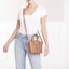 M.C.M VISETOS RABBIT MINI SHOPPER CROSSBODY BAG กระเป๋าถือ/สะพายข้าง ดีไซน์ลายพริ้นท์น้องกระต่าย 🐰🐰 น่ารักแต่แอบหรู ใบเล็ก ไซส์มินิ พกพาสะดวกไม่เกะกะ วัสดุหนังแคนวาสคุณภาพดี ปากกระเป๋ามีซิปรูดกันของหล่น รูดใช้งานง่าย ภายในเป็นช่องโล่ง มาพร