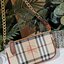 BURBERRY FRAGRANCES CLUTH BAG VIP GIFT WITH PURCHASE (GWP) คลัชพรีเมี่ยมกิ๊ฟ Limited Edition รุ่นหายาก จาก BURBERRY FRAGRANCES COUNTER หนังลาย Vintage Signature สุดคลาสสิค มาพร้อมสายโซ่คล้องมืออะไหล่ทอง เปิดปิดด้วยซิปสะดวกใช้ สามารถใส่มือถือ เงิน บัตรเครด