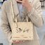 Coach X Peanuts Dempsey Tote 22 With Snoopy And Friends Motif CE850 คอลเลคชั่นใหม่ น้องน่ารักเกินต้านไปมาก!! กับกระเป๋าทรงโท้ท ไซส์กำลังสวย ดีไซน์ ลายการ์ตูนยอดฮิต ที่ใครๆก็ต้องรู้จัก พิมพ์คมชัดลงบนหนัง pepble ผิวสัมน่าใช้ ปากกระเป๋ามีกระดุมแม่เหล็กปิดกัน