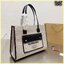 Burberry Freya Canvas Tote Bag Large กระเป๋าสะพายทรงโท้ทใบใหญ่จุใจ ดีไซน์ทรงเหลี่ยมสวยอยู่ทรง ด้านหน้ามีช่องใส่ของ ภายในโล่งกว้างจุของใช้ได้เยอะ