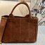 PRADA Suede Tote Bag กระเป๋าทรงโท้ทงานหนังกลับ สวยเด่นเป็นเอกลักษณ์มาก ดีไซน์เรียบแต่มากมีอยู่จริง สวยดูแพง ที่ไม่มีตอนนี้คือพลาด