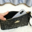 Coach Star Glitter Corner Zip Wristlet / FACTORY HK กระเป๋าคล้องมือทรงคลัช ตัวกระเป๋าตกแต่งกริ๊ตเตอร์ ด้านหน้าติดอะไหล่แบรนด์ สวยหรู เปิดปิดด้วยซิป ด้านในบุผ้ากำหยี่สามารถใส่โทรศัพท์มือถือได้ทุกรุ่น มาพร้อมสายคล้องมือ 1เส้น MUST HAVE!!