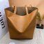 LOEWE Puzzle Fold Tote in shiny calfskin / LOEWE TOTE BAG 27cm พร้อมส่ง กระเป๋าทรงโท้ทใบใหญ่ ใช้งานง่ายเรียบหรู จุของได้เยอะ หนังเรียบสวยอยู่ทรงมาพร้อมสายสะพายยาวถอดได้ พับเก็บได้เป็นเอกลักษณ์