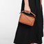 Loewe Nano Puzzle bag in classic โลเอเว่ (LOEWE) อีกหนึ่งกระเป๋าแบรนด์ดังจากสเปน ภายใต้คอลเลคชั่นใหม่อันร่วมสมัยของแบรนด์ มีความเป็นคลาสสิคและโมเดิร์นทันสมัย กระเป๋าที่มาในรูปแบบสี่เหลี่ยมผืนผ้า ที่สามารถใช้งานได้ทั้งแบบหูหิ้ว และแบบ Crossbody ด้านในมีช่อ