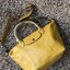 Longchamp Le Pliage Cuir Top handle bag S เรียกว่าเป็นกระเป๋าอีกหนึ่งรุ่นที่ไม่ว่ายังไงก็ฮอตฮิตและติดเทรนด์ตลอดไม่เคยเปลี่ยนกับ ทรง Le Pliage Cuir หนึ่งในตระกูลกระเป๋าสุดไอคอนิกจากแบรนด์