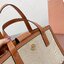 TORY BUTCH SMALL WALKER CANVAS กระเป๋าถือ สะพาย ดีไซสน์สวย เป็นเอกลักษณ์ วันดุผ้า CANVAS ด้านนอกประดับโลโก้แบรนด์ด้านหน้า ตัดด้วยหนังแท้รอบใบ ด้านในเปิดปิดด้วยหนังคาดกระดุมแม่เหล็ก แบ่งของใส่ของเป็นสองช่องใหญ่ พร้อมข่องซิปกลาง สามารถใส่ไอแพด กระเป๋าสตางค์