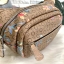 GUESS G LOGO FANNY PACK BELT BAG พร้อมส่ง รุ่นแนะนำเลยค๊าา❤️ กระเป๋าคาดเอว//คาดอก ได้ วัสดุ pvc อย่างดี หนังนิ่มดีมากค่ะ ตัวกระเป๋าออกแบบลาย G ทั้งใบ ผสมลาย multi floral เข้ามาได้สวยงามน่าใช้มากๆค่ะ ด้านหน้ามีโลโก้แบรนด์ และช่องซิปเล็กสำหรับใส่ของจ