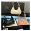 PRADA LEATHER HANDBAG กระเป๋าสะพายไหล่ดีไซน์เก๋และมาแรงมาก สาวๆติดแกลมต้องไม่พลาด สวยดูแพง หนังเงาหรูหรา