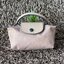 LONGCHAMP LE PLIAGE ORIGINAL Pouch with handle กระเป๋าถือขนาดมินิทรงpouch ให้ความหรูหราจาก Le Pliage (เลอ ปลิยาจ) ในขณะที่ที่ปิดแบบซิปช่วยให้คุณมั่นใจได้