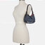 COACH C8163 KLEO HOBO IN SIGNATURE CHAMBRAY ใหม่ล่าสุด คอลเลคชั่นสุดคิ้วท์ ที่สาวๆต้องหลงรัก กระเป๋าสะพายทรงโฮโบ ที่ดีไซน์มาให้ปรับใช้งานได้หลากหลาย วัสดุผ้าแชมเบรย์ คมสวย รูดเปิด-ปิดด้วยซิป ภายในเป็นช่องโล่ง สายคล้องสามารถถอดออกใส่สายยาวสะพายข้างได้ หรือ