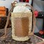 Loewe Bucket Bag / Loewe raffia and hemp bucket bag วัสดุ Textile Canvas & CalfSkin เป็นการนำวัสดุธรรมชาติมาสังเคราะห์หรือทอจนเป็นเนื้อเดียวกันคล้ายงานสาน มีความวินเทจในตัว น้ำหนักเบา ดูแลรักษาง่าย เหมาะกับยุคสมัยที่เข้ากับธรรมชาติและต้องการความคล่องตัว เ
