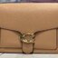 OUTLET 】COACH Tabby Shoulder Bag พร้อมส่งที่ไทย A modern take on an archival 1970s Coach design, our structured Tabby shoulder bag is crafted in polished pebble leather. Finished with our Signature hardware for an iconic touch, the versatile silhouette fe