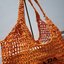 PRADA RAFFIA TOTE BAG สวยไม่ซ้ำใคร สไตล์บีช เหมาะมากกับการสะพายไปเที่ยวทะเล หรือจะใช้ในวันสบายๆก็ตอบโจทย์ กับกระเป๋าสะพายสานใบใหญ่ ตัวกระเป๋าเป็นวัสดุสังเคราห์จากธรรมชาติ สานทอเต็มใบออกมาเป็นลวดลายสวยงาม