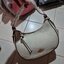 COACH C8163 KLEO HOBO IN SIGNATURE CHAMBRAY ใหม่ล่าสุด คอลเลคชั่นสุดคิ้วท์ ที่สาวๆต้องหลงรัก กระเป๋าสะพายทรงโฮโบ ที่ดีไซน์มาให้ปรับใช้งานได้หลากหลาย วัสดุผ้าแชมเบรย์ คมสวย รูดเปิด-ปิดด้วยซิป ภายในเป็นช่องโล่ง สายคล้องสามารถถอดออกใส่สายยาวสะพายข้างได้ หรือ
