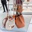 MIU MIU Canvas and leather bucket bag / MIU MIU Bucket Bag กระเป๋าทรงบัคเก็ต ผ้าแคนวาสอย่างดีตกแต่งโลโก้เพิ่มสัมผัสอันเป็นเอกลักษณ์