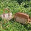 Tory Burch T-Monogram Mini Embossed Wine Bucket Bag / Tory Burch Mini Bucket กระเป๋าถือหรือสะพายไหล่ ทรงหมอนขนาดเล็ก ประดับด้วยลวดลายอันเป็นสัญลักษณ์ของแบรนด์ ถูกประดิษขึ้นด้วยความพิถีพิถันวัสดุหนังอย่างดี ด้านในบุด้วยหนังไมโครซูแอคเนื้อนุ่มทำความสะอาดง่า