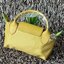 LONGCHAMP LE PLIAGE ORIGINAL Pouch with handle กระเป๋าถือขนาดมินิทรงpouch ให้ความหรูหราจาก Le Pliage (เลอ ปลิยาจ) ในขณะที่ที่ปิดแบบซิปช่วยให้คุณมั่นใจได้