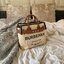 BURBERRY FRAGRANCES TOTE BAG อีกหนึ่งไอเท็มหายาก วัสดุ Canvas & Leather Calfskin ดีไซน์สวยมีเอกลักษณ์คาดด้วยสายหนังประดับกระดุมทองด้านหน้า หูจับหนังแท้จับถนัดมือ สายสะพายยาวหนังแท้ถอดได้ปรับระดับได้อะไหล่แบรนด์ ภายในโล่งกว้างมีช่องใส่ของใส่เอกสารA4 กระเป๋