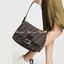FENDI MAMMA BAGUETTE ZUCCA BROWN FABRIC BAG (GWP) พรีเมี่ยมกิ๊ฟ Limited Edition จาก FENDI วัสดุ CANVAS พิมพ์ลายแบรนด์ เปิดปิดด้วยฝาปิดกระดุมแม่เหล็ก ภายในมีช่องซิป ใส่ของแยกอีกช่อง สามารถใส่กระเป๋าสตางค์ยาว iphone เงิน ของจุกจิกได้ มาพร้อมสายสะพาย2แบบ ถอด