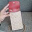 COACH NORTH/SOUTH PHONE CROSSBODY IN SIGNATURE CANVAS F55636 F39955 สุดคลาสสิคกับกระเป๋าสะพายเอนกประสงค์ Case phone ใส่โทรศัพท์มือถือได้ทุกรุ่น ดีไซน์ลายเอกลักษณ์ วัสดุหนังแคนวาสเคลือบลาย ฝาและภายในเป็นหนังสังเคราะห์เรียบ เปิด-ปิดด้วยกระดุม สายสะพายยาวประ