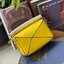 Loewe Nano Puzzle bag in classic โลเอเว่ (LOEWE) อีกหนึ่งกระเป๋าแบรนด์ดังจากสเปน ภายใต้คอลเลคชั่นใหม่อันร่วมสมัยของแบรนด์ มีความเป็นคลาสสิคและโมเดิร์นทันสมัย กระเป๋าที่มาในรูปแบบสี่เหลี่ยมผืนผ้า ที่สามารถใช้งานได้ทั้งแบบหูหิ้ว และแบบ Crossbody ด้านในมีช่อ