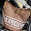 Celine Bucket Bag In Textile with Celine Logo สาว ๆ คนไหนกำลังมองหากระเป๋าสะพายที่สามารถจุของได้แบบกำลังพอดี เราขอแนะนำเป็นใบนี้เลยค่ะ เพราะมีขนาดที่ไม่เล็กและไม่ใหญ่จนเกินไป ให้ความคล่องตัวสูง มีฐานกว้างสามารถใช้สะพายไหล่เมื่อต้องการออกงานทางการหรือจะสะพ