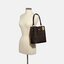 COACH SMALL TOWN BUCKET BAG IN SIGNATURE สำหรับสาวแฟชั่นที่ชอบรายละเอียดชิคๆ ดีไซน์สุดเก๋ แนะนำเลยสำหรับกระเป๋าทรงบักเก็ตใบนี้ เชื่อว่าสาว ๆ หลายคนชื่นชอบ เป็นไอเทมที่สามารถแมทช์ได้กับเสื้อหลากหลายสไตล์ บรรจุของได้เยอะโดยที่กระเป๋าไม่เสียทรง แบ่งช่องใช้งา