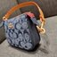 COACH C8665 NOLITA 15 IN SIGNATURE CHAMBRAY คอลเลคชั่น rare item น่ารักน่าใช้ ในสไตล์คลาสสิค กระเป๋าทรงพอชขนาดมินิ กึ่งคล้องมือใช้ได้ 2 สไตล์ ปรับสายให้มาเกี่ยวฝั่งเดียวเพื่อใช้เป็นคล้องมือ หรือปรับเกี่ยวอีกฝั่งใช้คล้องแขนก็เก๋มากมาย วัสดุผ้าแชมเบรย์ สวยค