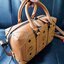 M.C.M SMALL E/W SOFT BERLIN CROSSBODY IN VISETOS ไอเท็มใหม่ในดีไซน์ทรงกระเป๋าเดินทางแบบคลาสสิค ย่อส่วนมาให้ใช้งานได้แบบสบายๆ พกพาสะดวก แมทช์ได้ทุกสไตล์ ใช้ได้แบบ unisex ใช้งานง่ายด้วยหูจับในตัว และซิปหลัก อะไหล่สีดำดูมีมิติตัดกับสีน้ำตาลคอนยัคได้เป็นอย่าง