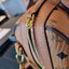 M.C.M ESSENTIAL BOSTON BAG IN VISETOS กระเป๋าถือ/สะพายข้าง ทรงหมอน สวยโดดเด่น ทรงสวยยอดนิยม มาพร้อมพวงหนังห้อย และสายรัดเก็บหูจับ วัสดุหนังแคนวาสคุณภาพดี เปิด-ปิดด้วยซิป ภายในเป็นหนังกลับ โล่งกว้าง ใส่ของได้เยอะ กระเป๋าสตางค์ โทรศัพท์ ของจุกจิกต่างๆ สบาย!