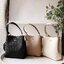 COACH 1011 SMALL TOWN BUCKET BAG รุ่นยอดนิยมใบเล็ก กระเป๋าทรงบัคเก็ต สีคลาสสิคเรียบหรู ตัดกับโลโก้สีทองดูโดดเด่น วัสดุหนัง pepble สวยคมทุกมุมจริงๆ!! เปิด-ปิดด้วยกระดุมแม่เหล็กทั้ง 2 ฝั่ง ภายในเป็นช่องโล่ง มาพร้อมสายสะพายปรับได้ตามตัว ขนาดใบนี้กำลังสวย สะพ