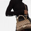 BALENCIAGA Hourglass BB Monogram top-handle tote bag กระเป๋าสะพายแบรนด์หรูซิกเนเจอร์ใบล่าสุด ที่มาพร้อมดีไซน์โดดเด่น มีความโฉบเฉี่ยว โค้งมนเหมือนพระจันทร์เสี้ยว เพิ่มความโดดเด่นสะดุดตาด้วยการตกแต่งอักษร B เมทัลลิก ที่เป็นเอกลักษณ์แบรนด์ งานจริงสวยงามตามรู