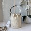 TORY BURCH mini T Monogram leather bucket bag กระเป๋าบัคเกต ไซต์ mini คอลเลกชันหนัง T Monogram ลายซิกเนเจอร์หนังปั้มลายนูน